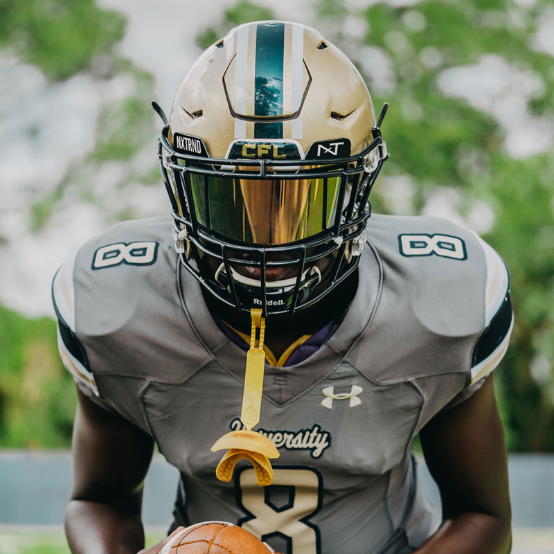 Load image into Gallery viewer, Football Mouthguard Gold
