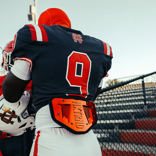 NXTRND B-PLATE™ Football Back Plate Chrome Orange